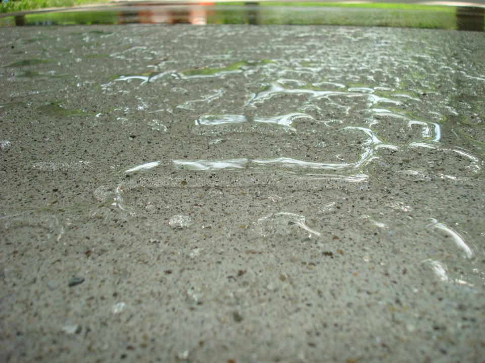 Close-up of effects of concrete sealer